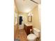Narrow bathroom with a tile floor, single vanity, and a shower with a curtain at 35 East Honeysuckle Ln, Carrollton, GA 30116