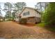 Two-story home with manicured yard at 35 East Honeysuckle Ln, Carrollton, GA 30116
