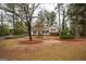 Charming front yard with mature trees at 35 East Honeysuckle Ln, Carrollton, GA 30116