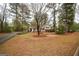 Charming home with spacious front yard and driveway at 35 East Honeysuckle Ln, Carrollton, GA 30116