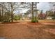 Large open front yard perfect for outdoor activities or future landscaping projects at 35 East Honeysuckle Ln, Carrollton, GA 30116