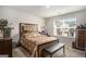Cozy bedroom with a large window and comfortable furnishings at 1310 Rogers Trce, Lithonia, GA 30058