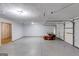 Spacious garage with painted floor and modern door at 217 Old Carrollton Rd, Carrollton, GA 30116