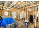 Spacious unfinished basement with exposed beams and ample natural light at 275 Cedars Glen Cir, Villa Rica, GA 30180