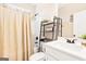 Clean bathroom featuring a shower, toilet, vanity, and modern shelving at 275 Cedars Glen Cir, Villa Rica, GA 30180