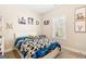 Bright bedroom features a playful design, ample natural light, and neutral paint at 275 Cedars Glen Cir, Villa Rica, GA 30180