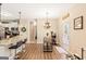 Cozy dining area adjacent to kitchen with breakfast bar and view of backyard at 275 Cedars Glen Cir, Villa Rica, GA 30180