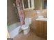 Bathroom featuring a shower-tub combo and a vanity with a sink at 2563 Highway 81 E, Mcdonough, GA 30252