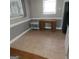 Bright dining room with tile floors and space for a desk or dining set at 2563 Highway 81 E, Mcdonough, GA 30252