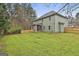 Large, fenced backyard offers plenty of space for recreation and relaxation with a well-maintained lawn at 205 Valley View Dr, Tyrone, GA 30290