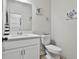 Bathroom featuring a vanity with white countertop, and a toilet at 205 Valley View Dr, Tyrone, GA 30290