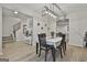 Open dining room with modern light fixture and stylish decor at 205 Valley View Dr, Tyrone, GA 30290
