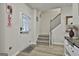 Inviting entryway featuring a staircase, and stylish decor at 205 Valley View Dr, Tyrone, GA 30290