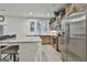 Kitchen featuring stainless steel appliances and island with seating at 205 Valley View Dr, Tyrone, GA 30290