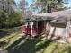 Cozy back deck overlooking the backyard, perfect for relaxing at 61 Scoby Ct, Jonesboro, GA 30238