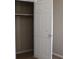 Interior view of a closet with a white door and shelf at 61 Scoby Ct, Jonesboro, GA 30238