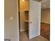 An organized closet featuring built-in shelves and a hanging rod at 61 Scoby Ct, Jonesboro, GA 30238