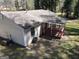 Exterior shot of the back of the house with a back deck at 61 Scoby Ct, Jonesboro, GA 30238