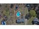 Expansive backyard with private pool, patio area, and lush greenery surrounding the beautiful property at 809 Mcbean Ct, Mcdonough, GA 30252