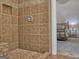 Beautiful tiled shower featuring a built-in seat and tiled floor and walls at 809 Mcbean Ct, Mcdonough, GA 30252