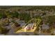 Aerial view showcases the property boundary, lush landscaping, swimming pool, and established trees at 265 Ridgewood Dr, Fayetteville, GA 30215