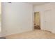 Bedroom with neutral carpet features a doorway, closet, and an outlet at 265 Ridgewood Dr, Fayetteville, GA 30215