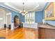 Inviting dining room features elegant decor, a chandelier, and a sunny window at 265 Ridgewood Dr, Fayetteville, GA 30215