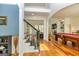 Open foyer showcases stairs, soaring ceilings, hardwood floors, and a glimpse of the living area at 265 Ridgewood Dr, Fayetteville, GA 30215