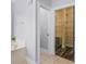 Bright bathroom with a bathtub next to a walk-in closet at 142 Gillson Dr, Mcdonough, GA 30253