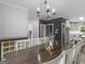 Stunning dining room featuring hardwood floors, a chandelier, and plenty of space to entertain at 142 Gillson Dr, Mcdonough, GA 30253