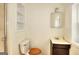 Classic bathroom with a vanity, toilet, and shower, featuring a clean and functional design at 6316 Rockland Rd, Lithonia, GA 30038