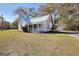 Inviting home on a beautiful lot, perfect for relaxing or entertaining in the lovely outdoor setting at 6316 Rockland Rd, Lithonia, GA 30038