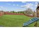 Expansive backyard boasts a playground and ample space for recreation and entertainment at 4365 Sunflower Cir, Cumming, GA 30040