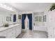 Bright primary bathroom featuring double sinks, a soaking tub, and a glass shower, for ultimate relaxation at 4365 Sunflower Cir, Cumming, GA 30040