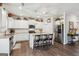Charming kitchen with stainless steel appliances, granite counters, and an island with seating at 4365 Sunflower Cir, Cumming, GA 30040