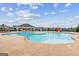 Community pool featuring a zero entry, shade, and an adjacent splash pad at 4365 Sunflower Cir, Cumming, GA 30040
