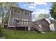 Backyard showcasing the deck, lawn, and back of the house at 109 Bowen Cir, Atlanta, GA 30313