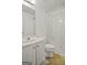 Bright bathroom features white vanity, large mirror, and shower-tub combo with a plastic curtain at 109 Bowen Cir, Atlanta, GA 30313