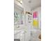 Bright bathroom offers tile floors, shower with tub, and a vanity sink with plenty of storage at 109 Bowen Cir, Atlanta, GA 30313