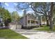 Charming two-story home with a detached garage and driveway at 109 Bowen Cir, Atlanta, GA 30313