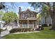 Charming two-story home with a inviting front porch and well-manicured lawn at 109 Bowen Cir, Atlanta, GA 30313