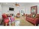 Spacious living room with fireplace, comfortable seating, and hardwood floors at 109 Bowen Cir, Atlanta, GA 30313