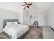 Bedroom with neutral carpet, vaulted ceiling, and a view of en-suite bath at 605 Camano Way, Mcdonough, GA 30253