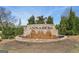 Community entrance sign featuring the name 'ANNABERG' with a brick water feature and landscaping at 605 Camano Way, Mcdonough, GA 30253