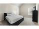 Cozy bedroom features neutral colors, a comfortable bed, natural light, and closet for ample storage at 2458 Walker Dr, Hampton, GA 30228