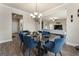 Elegant dining room flows into living area, offering plenty of natural light at 2458 Walker Dr, Hampton, GA 30228