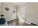 Inviting entryway featuring wood-look floors, a rear door and a classic design at 2458 Walker Dr, Hampton, GA 30228