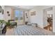 Versatile bonus room with a large window, comfortable seating, and ample space for relaxation or entertainment at 8110 Brewton Bnd, Cumming, GA 30028