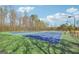 Outdoor tennis courts offer a beautiful landscape and an area for exercise and recreational activity at 8110 Brewton Bnd, Cumming, GA 30028