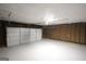 Spacious garage with exposed framing and mechanical systems at 5784 Sharon Dr, Norcross, GA 30071